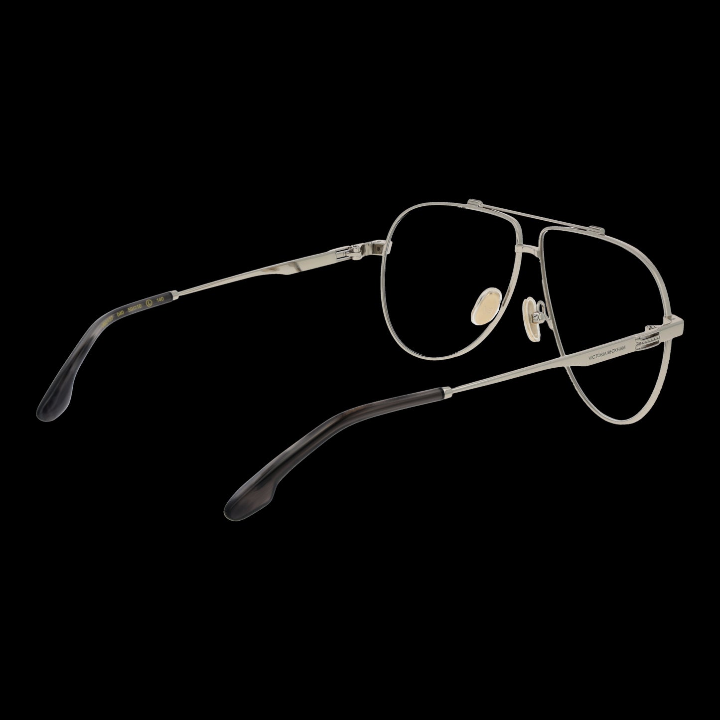 Fashionable women's eyewear VICTORIA BECKHAM MOD. VB2137 59040 in a sleek metallic frame design on a black background.