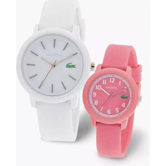 Two LACOSTE watches, one in white with a minimalist dial and the other in pink, showcasing brand's signature crocodile logo.