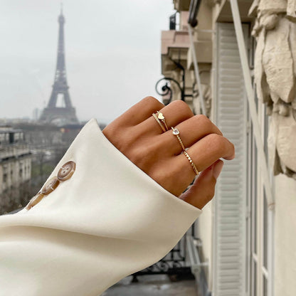 24KAE JEWELS JEWELRY Mod. 12417S/54 on hand with Eiffel Tower in the background