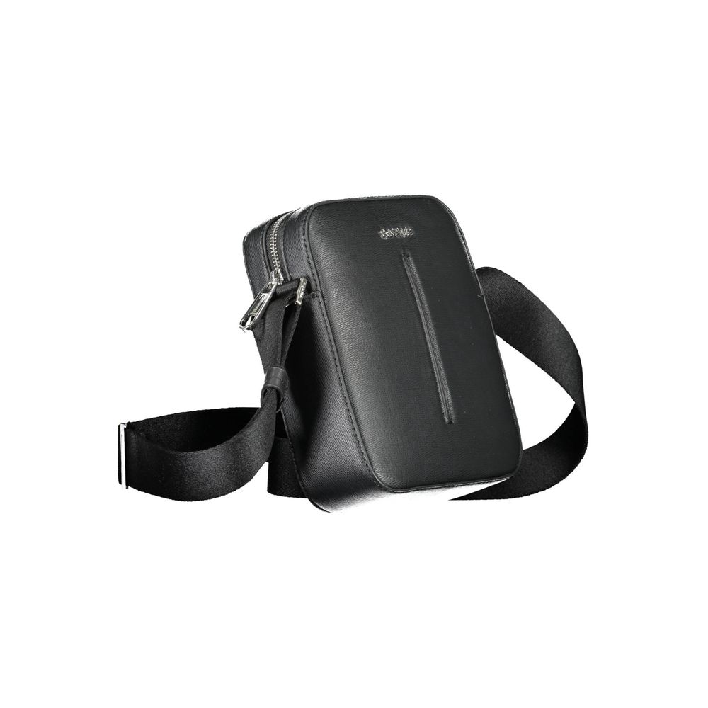Calvin Klein Black Polyester Men Shoulder Bag with adjustable strap and zip closure, eco-conscious design, made from recycled polyester.
