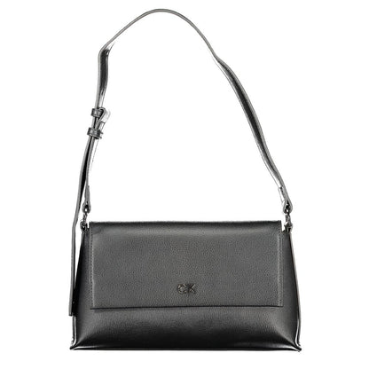 Calvin Klein Black Polyester Handbag with adjustable shoulder handle, internal pocket, snap closure, and logo.