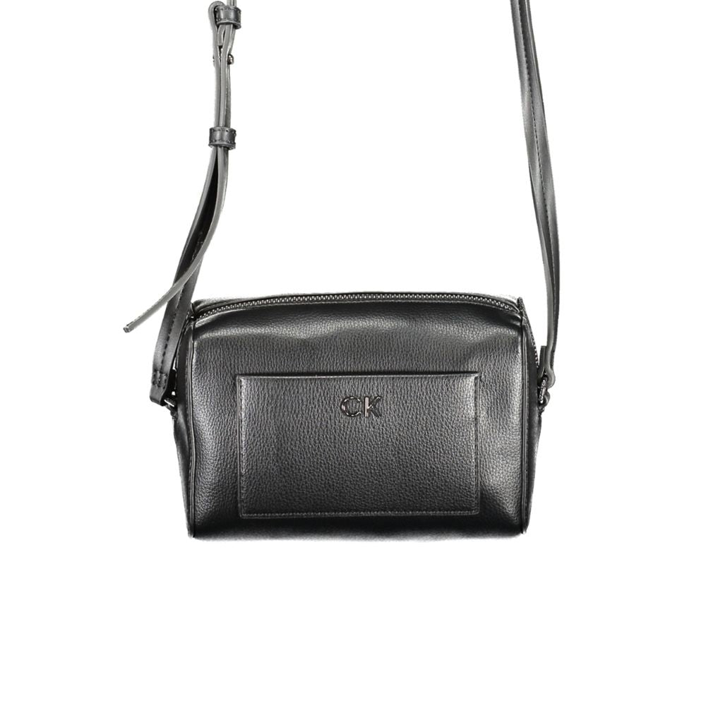 Calvin Klein Black Polyester Handbag with adjustable strap, external pocket, internal card pocket, zip closure, logo detail