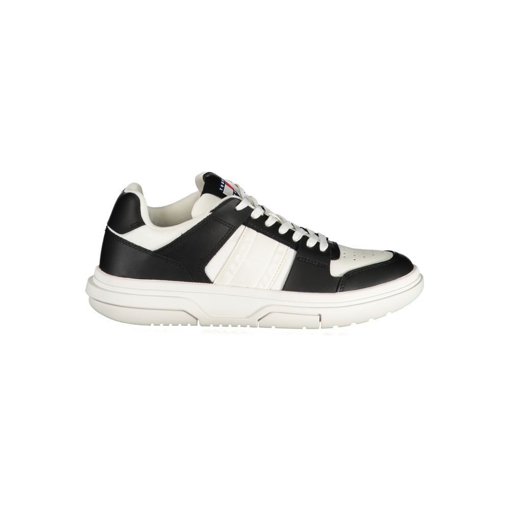 Tommy Hilfiger Black Leather Women Sneaker with contrasting white details and iconic logo, perfect for style-conscious trendsetters.