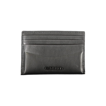 Calvin Klein Black Leather Wallet with card holder, double card spaces, central pocket, contrast details, and logo.