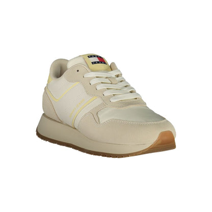 Tommy Hilfiger Beige Leather Women Sneaker with contrasting details and iconic logo, offering style and comfort.