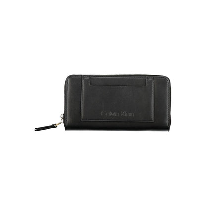 Calvin Klein Black Polyester Wallet with zip closure, 5 compartments, coin purse, card slots, external pocket, and logo detailing.