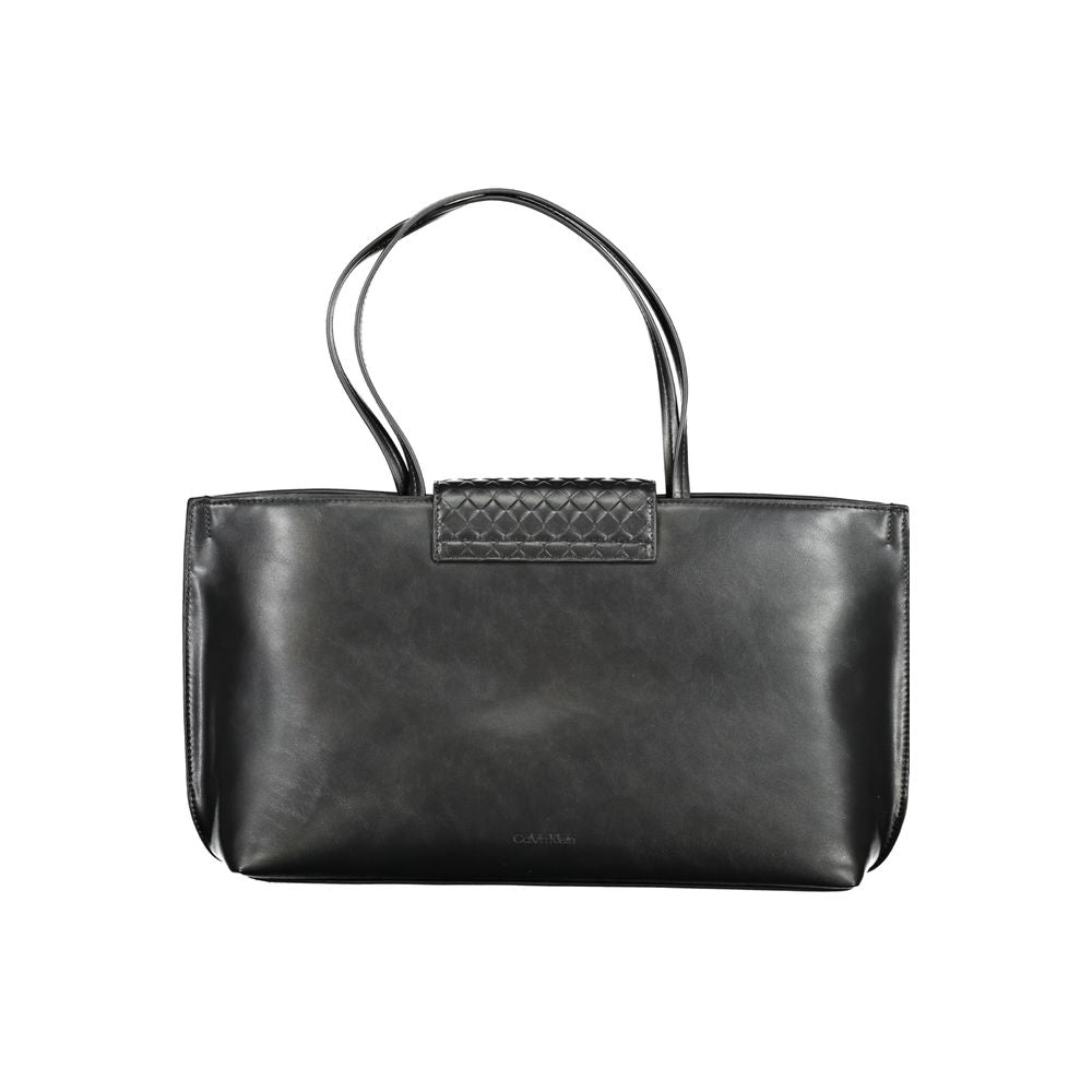 Calvin Klein Black Polyester Handbag with contrast details, double shoulder handles, magnetic closure, and one internal pocket.