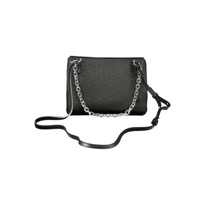 Calvin Klein Black Polyester Handbag with chain handle, adjustable strap, two compartments, turn closure, and logo design.
