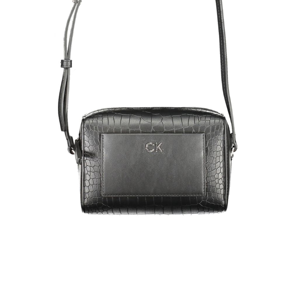 Calvin Klein Black Polyester Handbag with adjustable strap, external and internal pockets, zip closure, and contrast details.