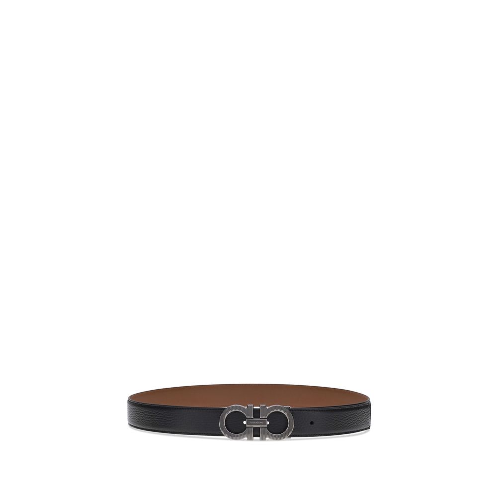 Ferragamo Black Calf Leather Bos Taurus Regular Belt with Gancini buckle in ruthenium finish, reversible and adjustable, elegant fashion accessory.