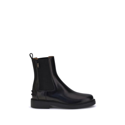 Tod's Black Calf Leather Bos Taurus Chelsea Boots with elastic inserts and embossed pebble rubber sole.