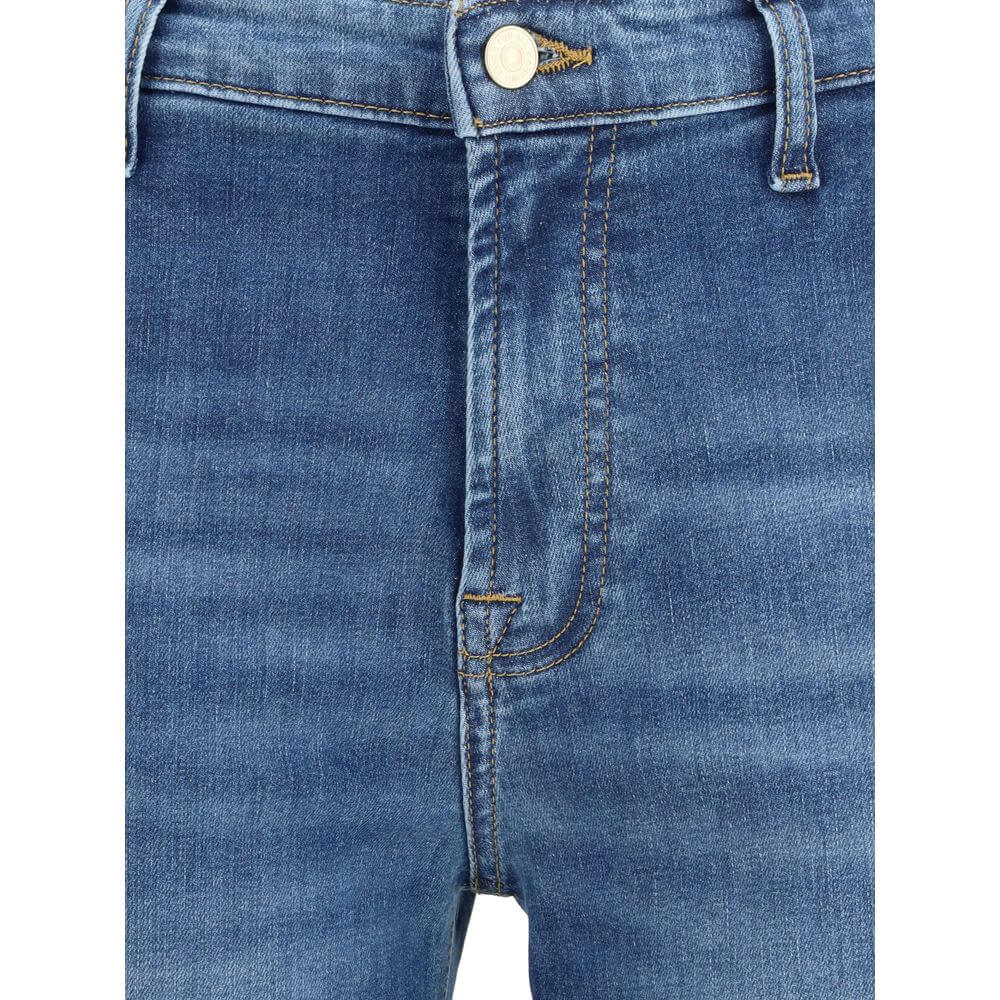 Close-up of 7FOR Blue Cotton Flared Jeans featuring front zipper, button closure, and waist loops for modern silhouette.