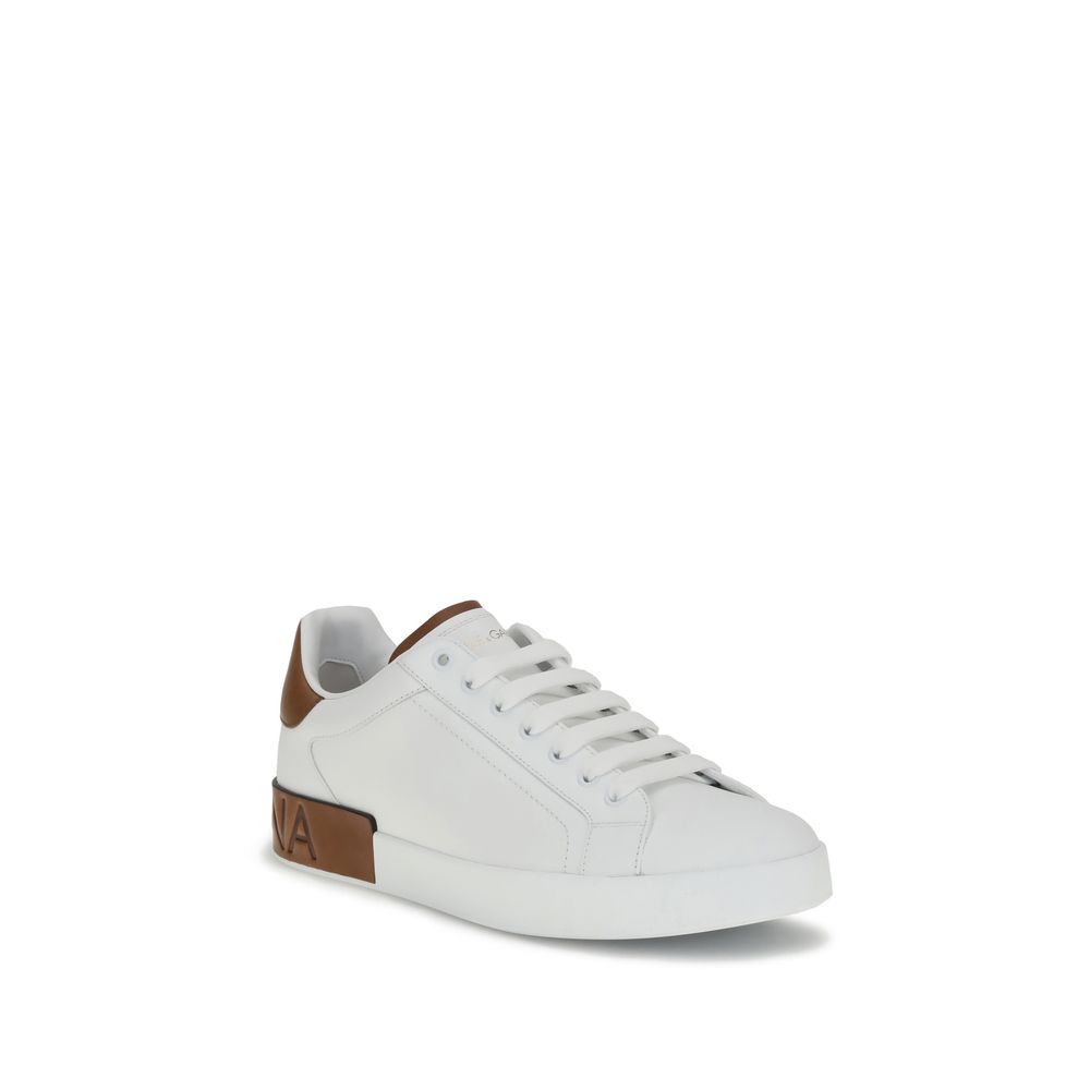 Dolce & Gabbana White Calf Leather Bos Taurus Low Top Sneakers with lace-up design, logo stripe, and heel detail, ideal for classy casual style.