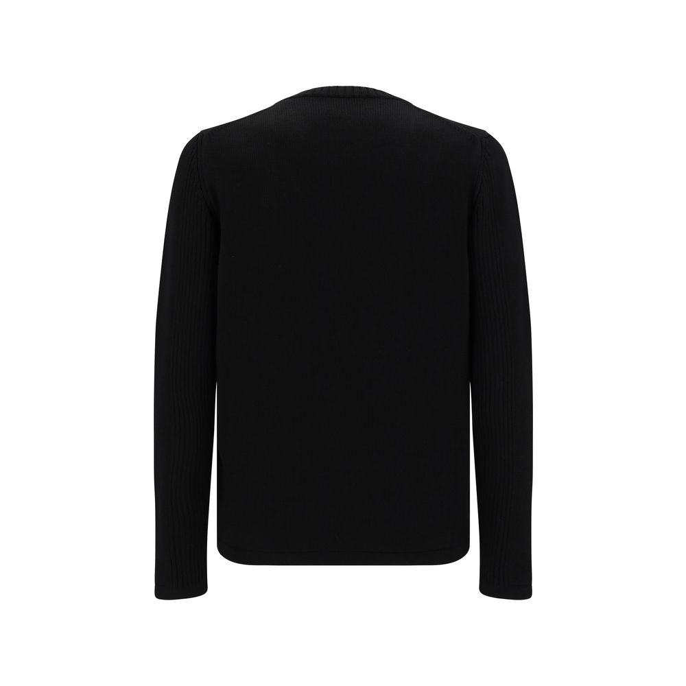 Back view of Prada Black Fleece Wool Sweatshirt with ribbed crew neck and zipper pocket, featuring iconic brand logo, made from virgin wool knit.