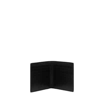 Saint Laurent Black Calf Leather Bos Taurus Wallet, open view showing card slots and bill compartment, iconic monogram on front.