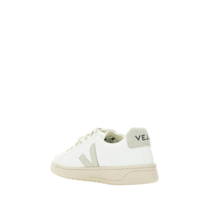 Veja White Rubber Low Top Sneakers with logo patch, lace-up front, and contrasting heel patch. Calfskin upper, rubber sole.
