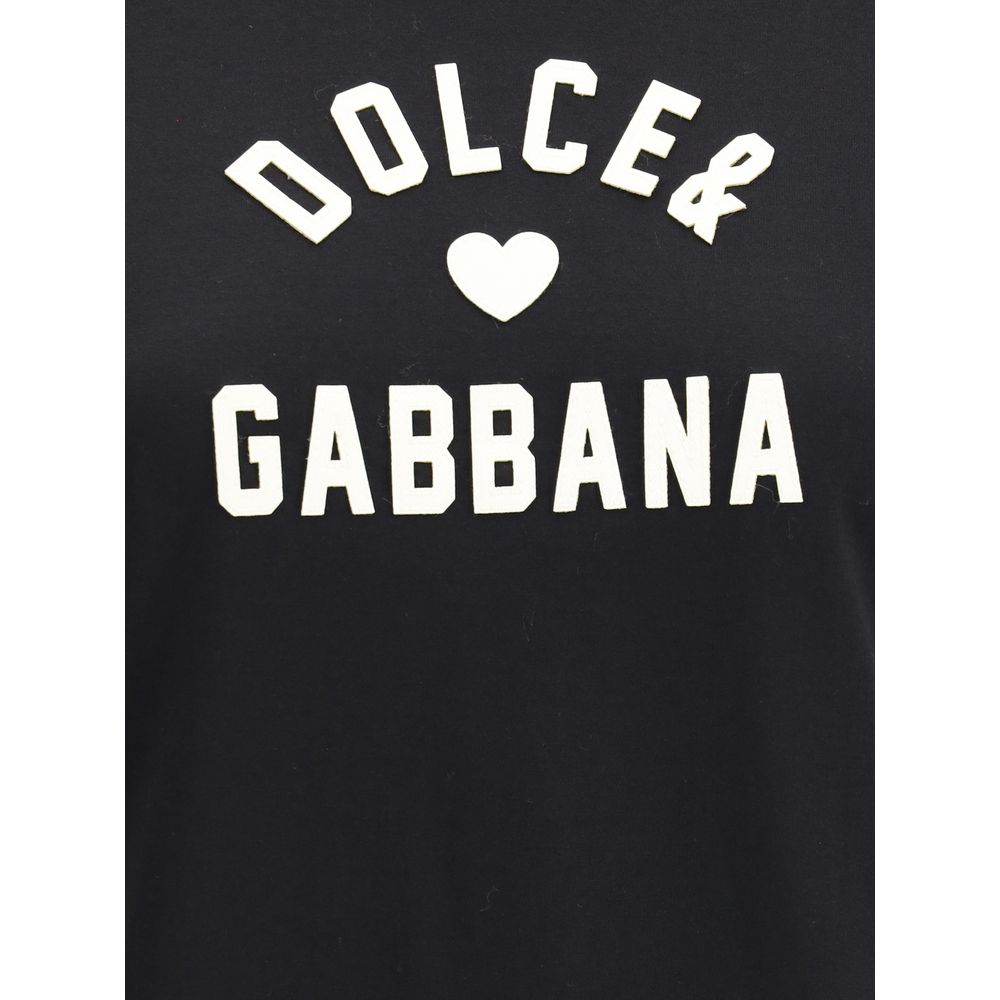 Dolce & Gabbana Black Cotton T-Shirt with logo patch detail, ribbed crew neck, for casual and trendy looks in AW25 season; 100% cotton.