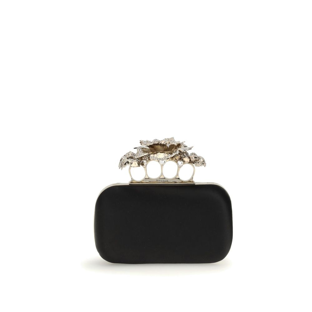 Front view of Alexander McQueen Black Silk Clutch Bag with crystal carnation knuckle handle and gold chain.