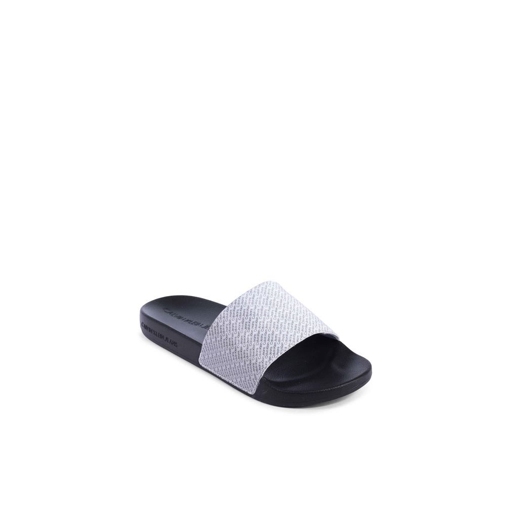 Calvin Klein Black Polyurethane Sandals for women, model YW0YW014030GN, featuring 100% thermoplastic polyurethane, size 35, in black.