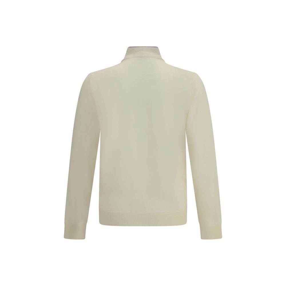Cruna Cream Wool Turtleneck showcasing the back view with a high ribbed collar and elegant design, perfect for autumn winter fashion.