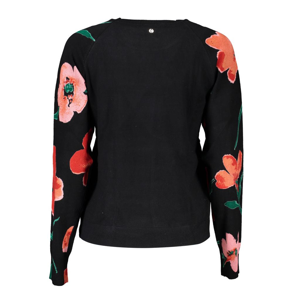 Back view of Desigual Chic Contrast Crew Neck Sweater featuring bold floral print and vibrant details.