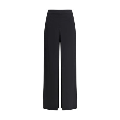 Di Stavnitser Black Polyester Casual Pants with wide leg and high waist, features sleek silhouette and invisible side zipper closure.