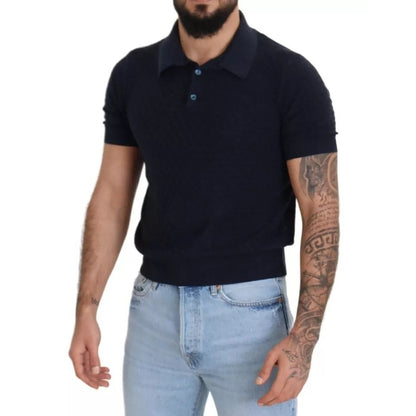 Model wearing Dolce & Gabbana Dark Blue Collared Polo Casual Silk T-shirt with short sleeves and tattoos, jeans.