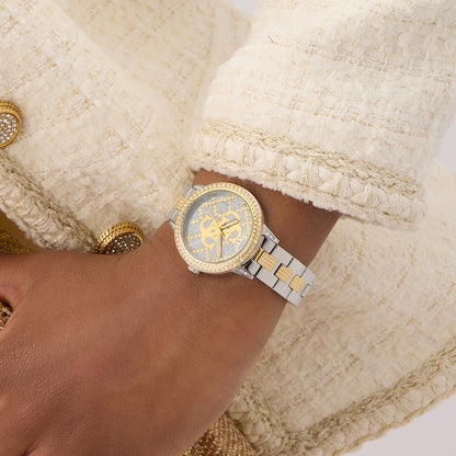 GUESS Mod. G Lace watch on wrist with gold and silver design, elegant style