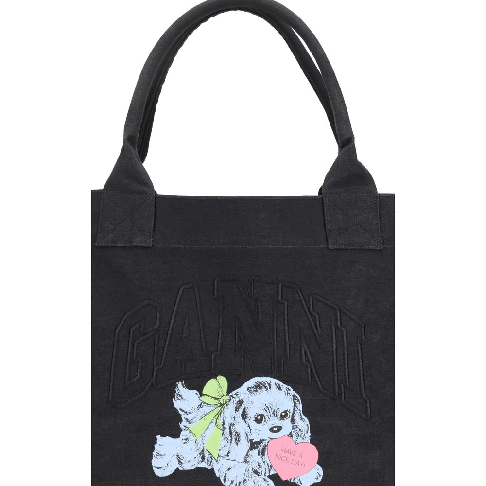 Ganni Black Recycled Cotton Shoulder Bag with puppy print and embroidered GANNI logo, featuring top handles, large interior, and zippered pocket.