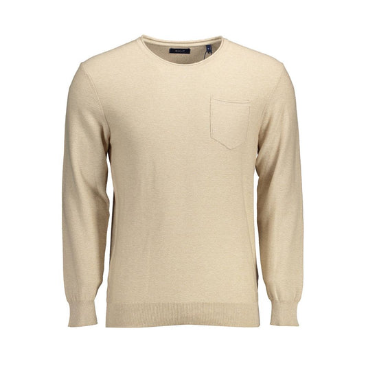 Gant Beige Cotton Men Sweater with long sleeves, crew neck, and front pocket, showcasing timeless elegance and iconic emblem.