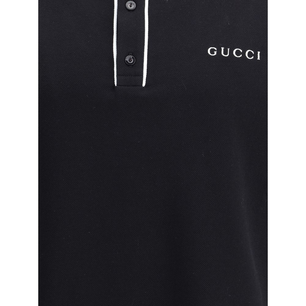 Gucci Black Cotton Polo Shirt with iconic monogram and contrasting collar detail, classic buttons, made for a stylish and dynamic fit.