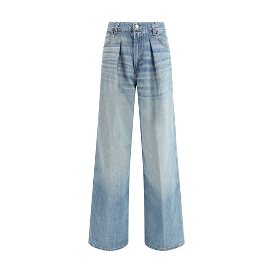 Haikure Light Blue Cotton Jeans Denim with wide-leg, medium waist, five-pocket design, front zipper, and logoed leather patch.