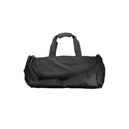 K-WAY Black Polyamide Luggage And Travel bag with adjustable shoulder strap, multiple pockets, contrasting details, and zip closure.