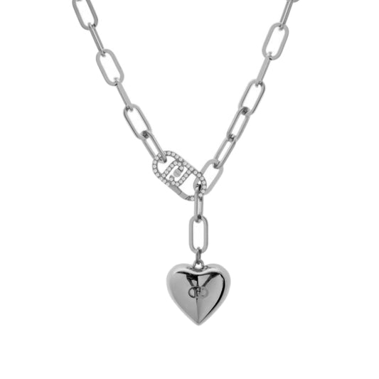 Elegant silver chain necklace with heart pendant and crystal-accented link on a white background.