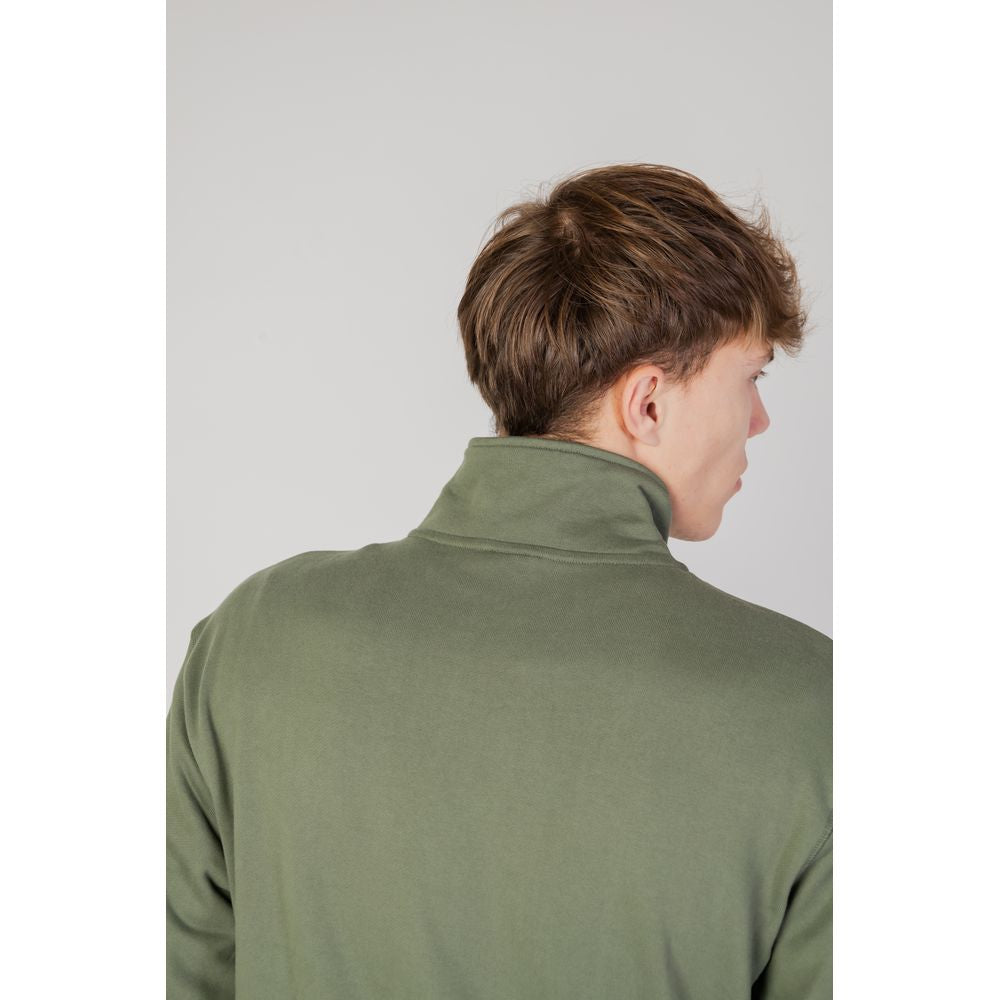 Back view of man wearing New Balance Green Cotton Sweatshirt with high collar