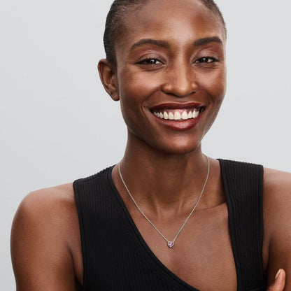Woman wearing PANDORA JEWELRY Mod. 398425C02-45 necklace, featuring a delicate silver chain and pendant.