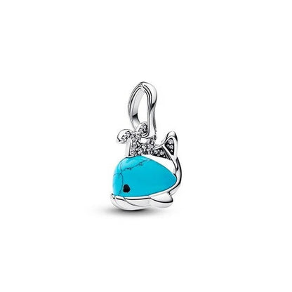 PANDORA JEWELRY Mod. 793822C01 turquoise whale charm with silver details and crystal accents.