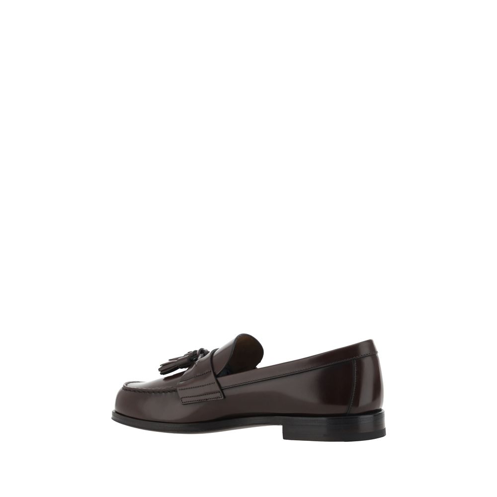 Prada Brown Calf Leather Bos Taurus Slip-On Loafers with tassel detail, side view