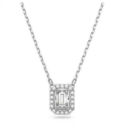 Elegant Swarovski crystal pendant necklace on silver chain with rectangular gemstone surrounded by smaller crystals, showcasing delicate design.
