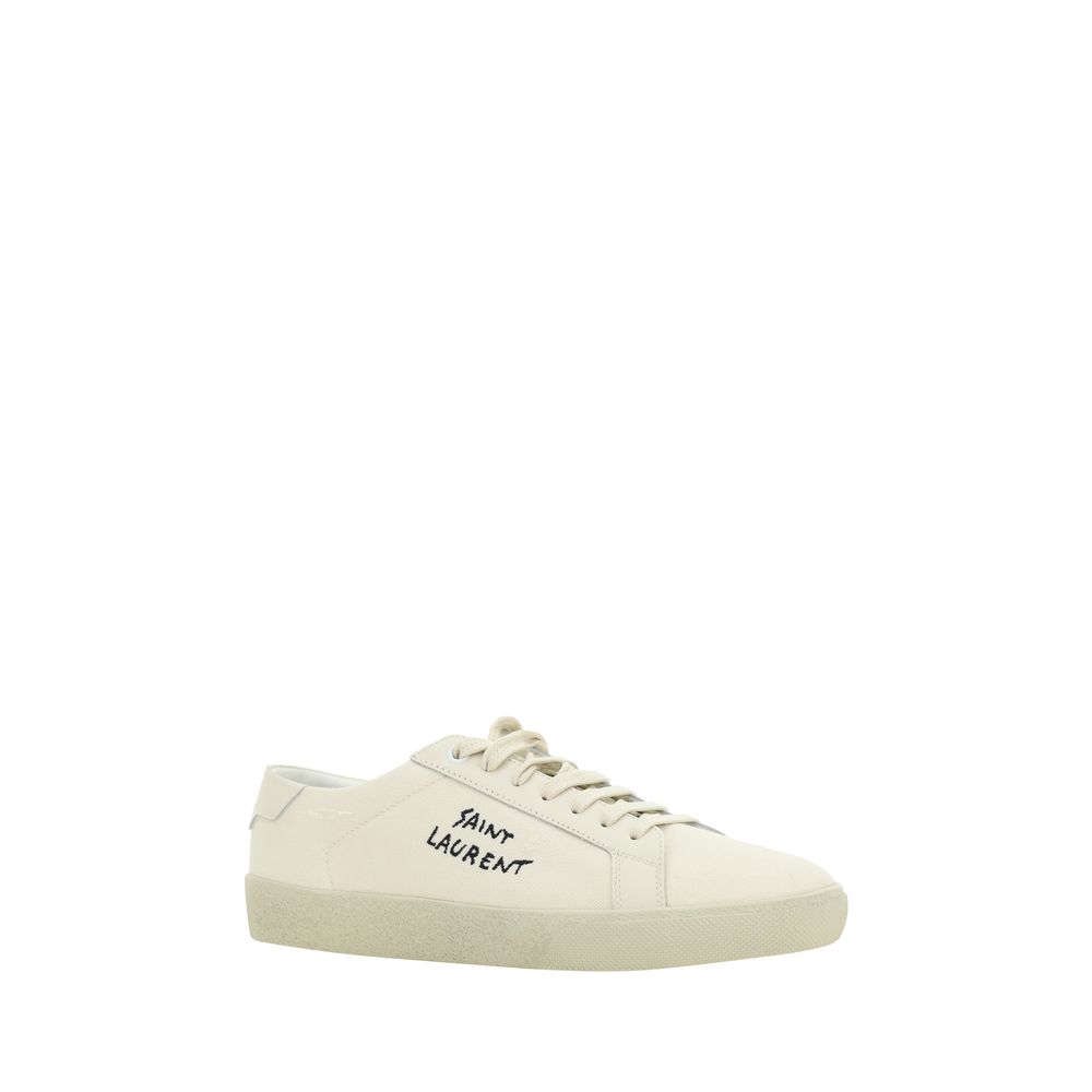 Saint Laurent White Rubber Low Top Sneakers with lace-up closure and crater-effect sole