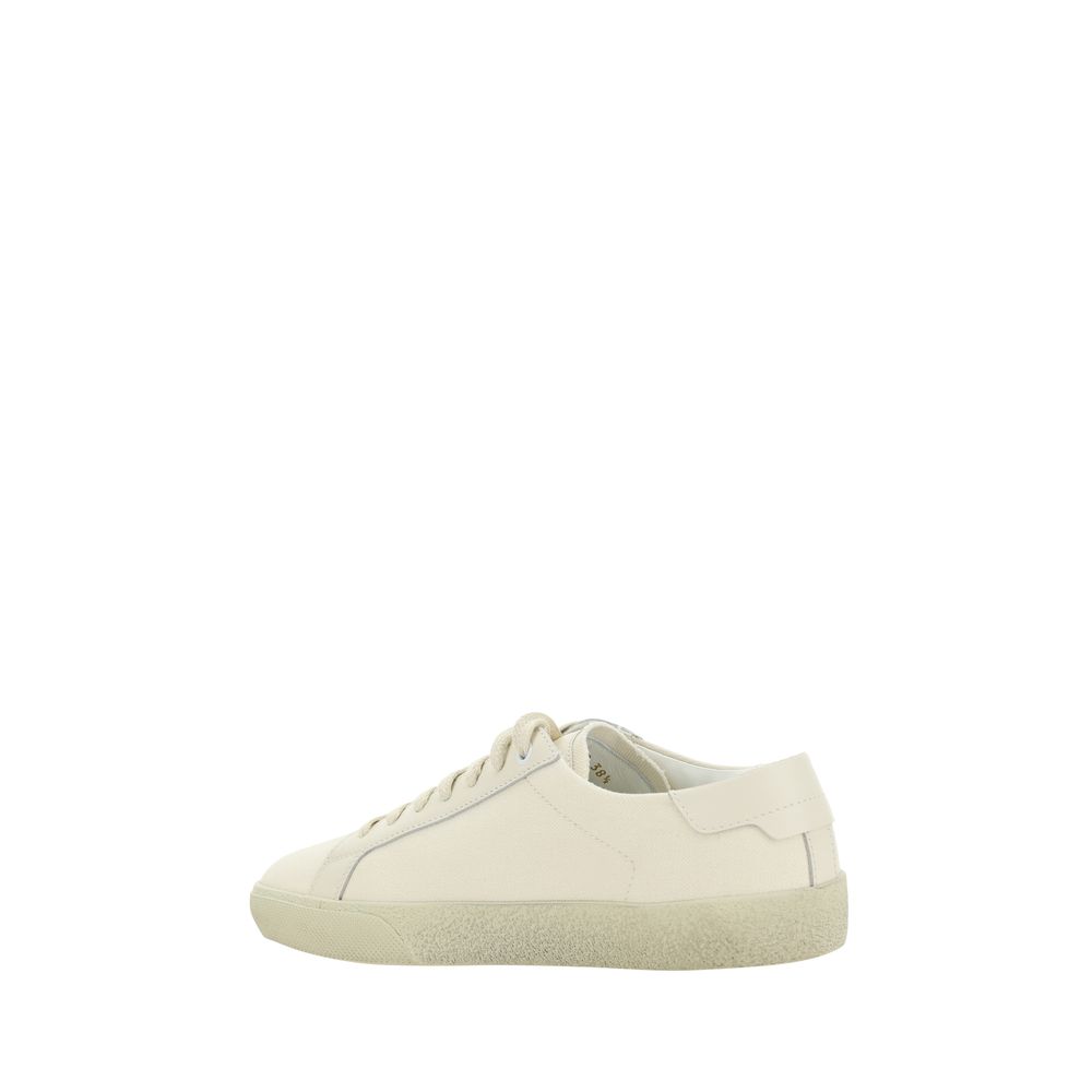 Saint Laurent White Rubber Low Top Sneakers with crater-effect sole and brand signature, side view.