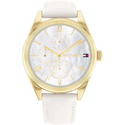 TOMMY HILFIGER Mod. 1782594 ladies watch with quartz analog movement, gold case, white strap, and official box packaging.