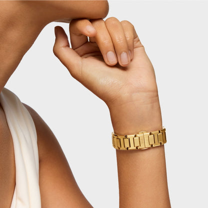 Stylish gold wristwatch showcasing TOUS WATCHES Mod. 3000144900 on a person's wrist for a sleek fashion statement.