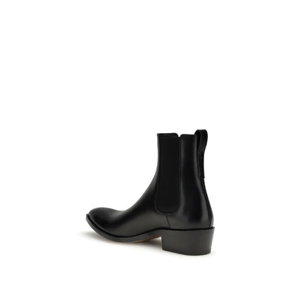 Side view of Tom Ford Black Calf Leather Bos Taurus Chelsea Boots with ankle-length design and solid block heel for men.