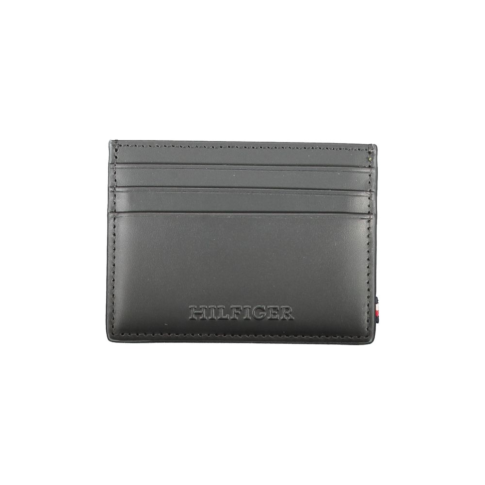 Tommy Hilfiger Black Leather Wallet with card holder, central pocket, card spaces, contrast details, and embossed logo.