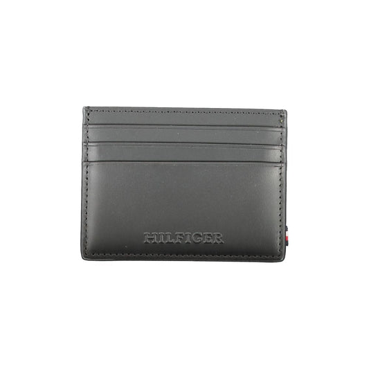 Tommy Hilfiger Black Leather Wallet with card holder, central pocket, card spaces, contrast details, and embossed logo.