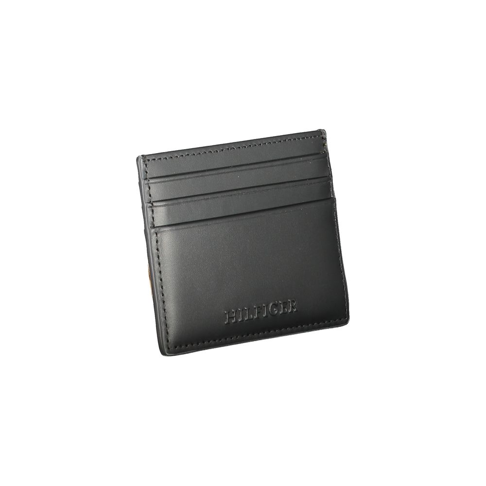 Tommy Hilfiger Black Leather Wallet with card holder, central pocket, and contrast details.