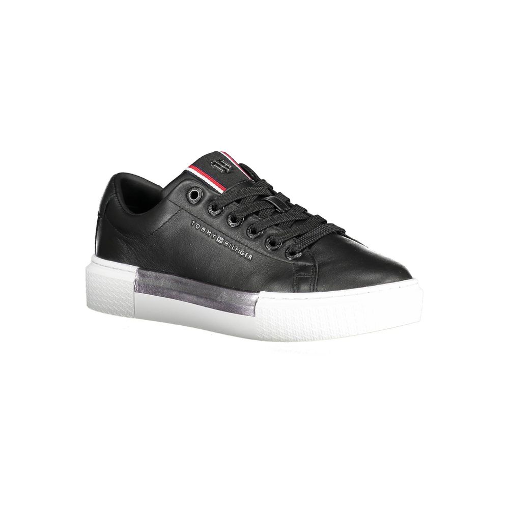 Tommy Hilfiger Black Leather Women Sneaker with white sole, showcasing sporty chic design and iconic logo detailing.