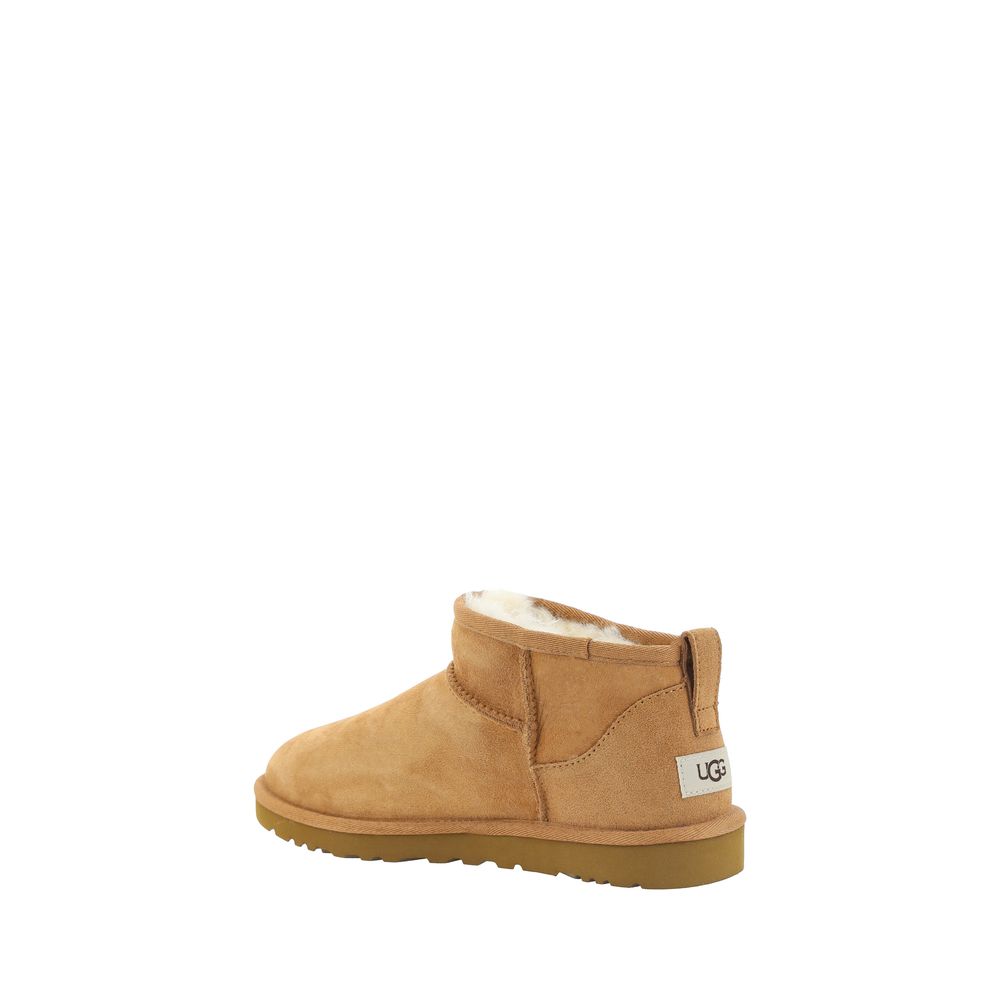 UGG Brown Goatskin Ankle Boots with shearling lining and durable knurled sole, showcasing iconic monogram on heel.