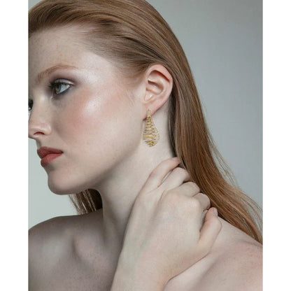 Woman wearing VICEROY JEWELS Mod. 2318E100-30 earrings, silver 925°, elegant design.
